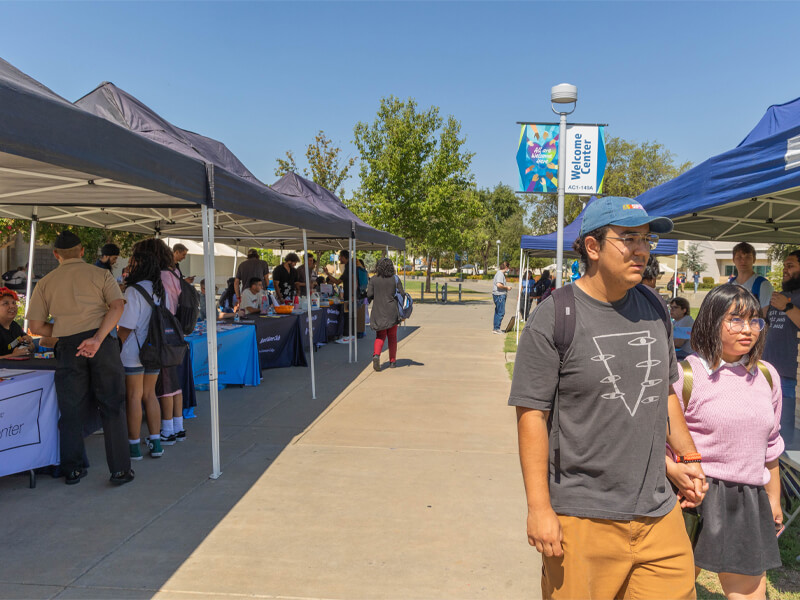 Students walking at the Club Rush event on campus