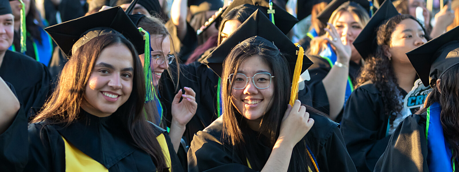 students celebrating graduation