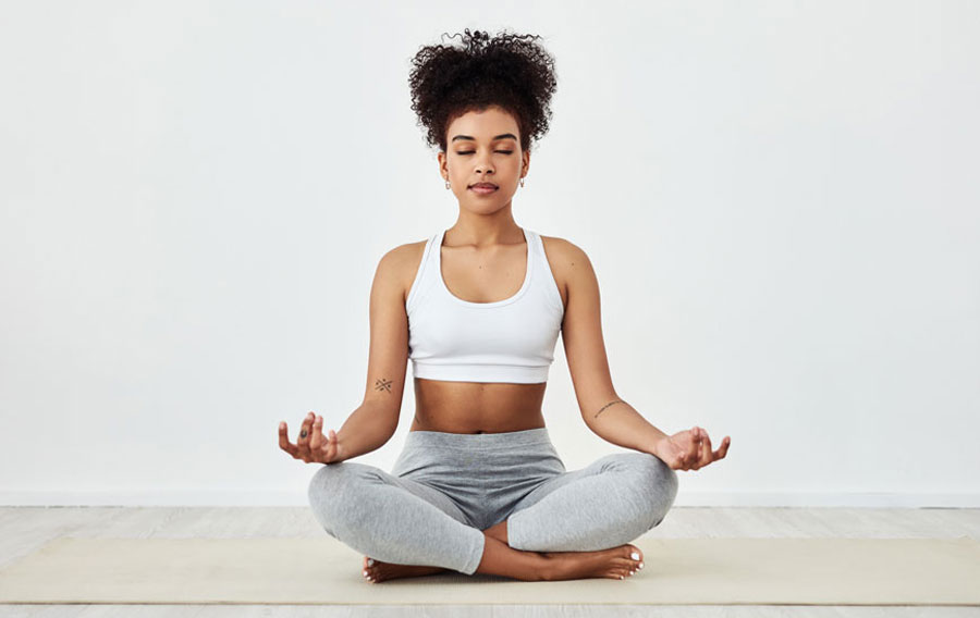 Person practicing yoga