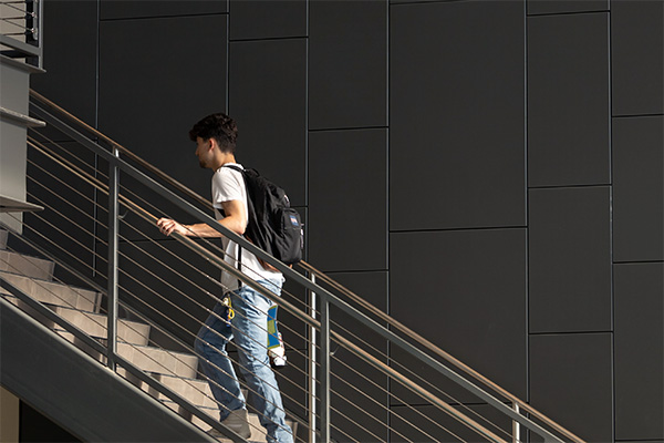 A student climbing the stairs