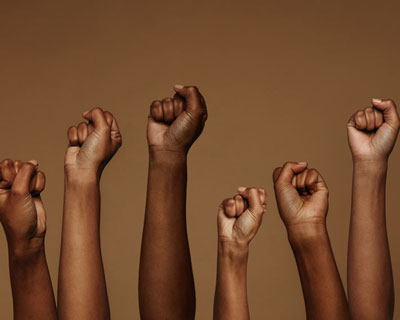 Raised fist, global symbol of fighting oppression