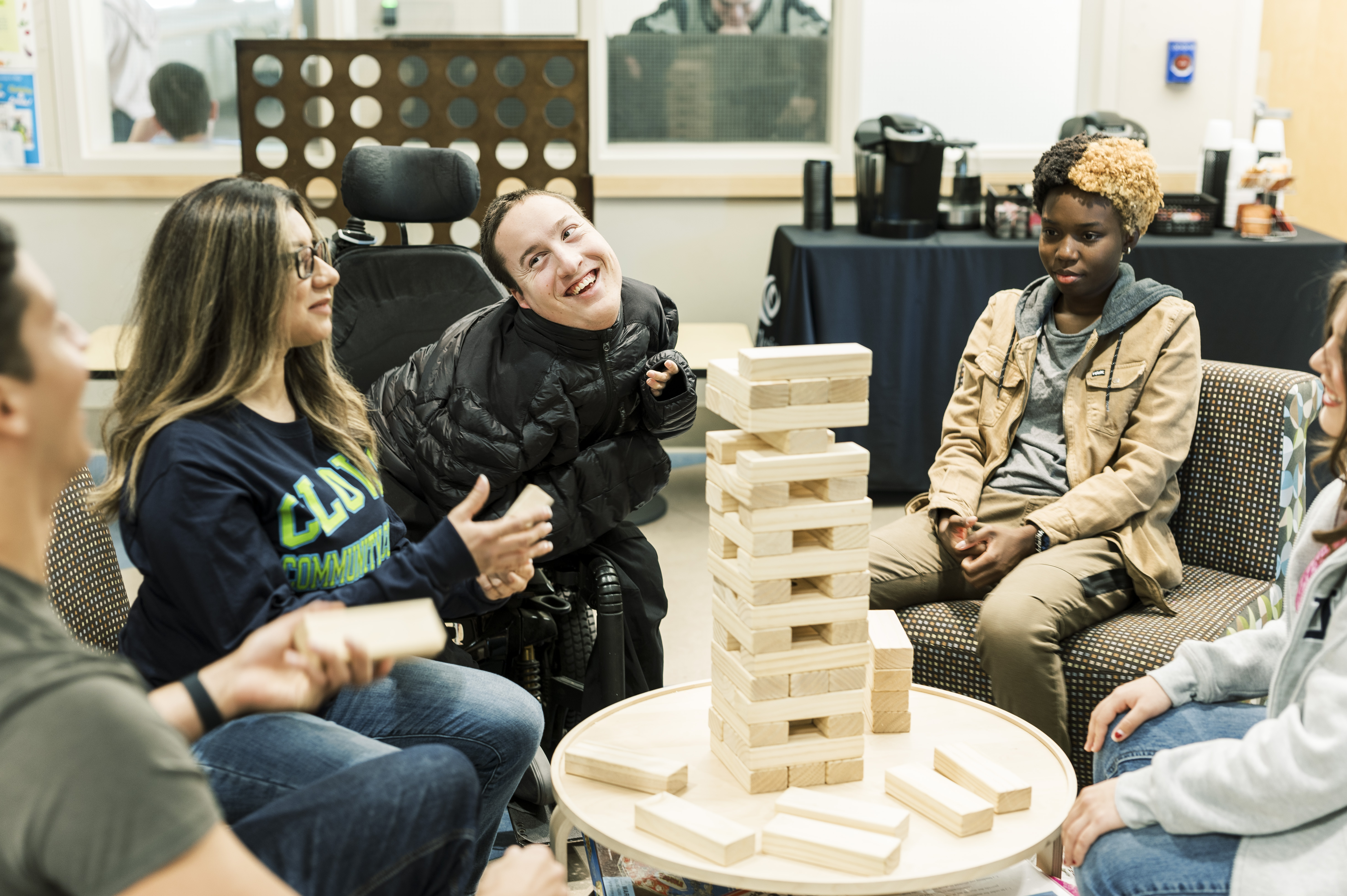 Group of students playing Jenga in the Student Center.